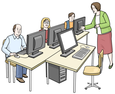 Vier Personen arbeiten gemeinsam an Computern in einem Schulungsraum.