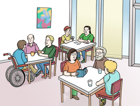 Menschen unterhalten sich. Sie spielen Karten in einem Gemeinschaftsraum.