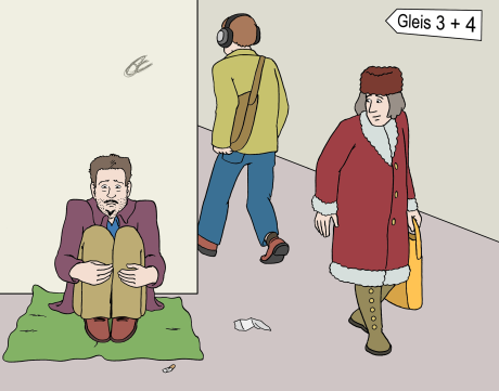 Ein obdachloser Mann sitzt an einem Bahnhof. Passanten gehen vorbei.